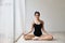 Beautiful healthy asian woman in ballet dress enjoying in meditates with yoga pose at home with relaxation