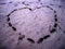 A beautiful heart full of love anchored on the sand