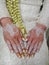 Beautiful henna in the hands of the bride