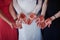 Beautiful henna patterns on hands of bride and her friends