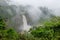 Beautiful hidden Ekom Waterfall deep in the tropical rain forest of Cameroon, Africa