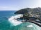 Beautiful high angle aerial drone view of a hot salt water pool and the ocean in St Clair, a beachside suburb of Dunedin