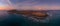 Beautiful high aspect aerial panoramic view of the evening moonrise over the island of Lobos near Corralejo in Fuerteventura