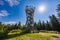 Beautiful high metal and spiral mountain viewing tower on top of Borowa mountain at sunny