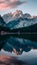Beautiful high Tatra mountain peaks reflected in calm lake
