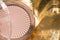 Beautiful highlighter for your best makeup. Cosmetic macro. Macro photography of highlighter for makeup on a gold background. For