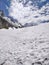 Beautiful hiking trail on snow in an epic glacial valley trek in Indian Himalayan Mountains.