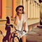 Beautiful hipster girl on a bicycle