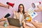 Beautiful hispanic woman working at the office under stress relax and smiling with eyes closed doing meditation gesture with