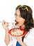 Beautiful Hispanic Young Woman Eating a Plate of Spaghetti Carbonara Cream Pasta
