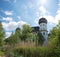 Beautiful historic moated castle Schwindegg, blue sky with sunshine and clouds, bavaria in spring