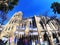 Beautiful historic red brick building with egg-shaped turrets in Barcelona.