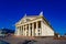 Beautiful historic yellow building on a blue background. Palace of Culture of Trade Unions