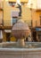 Beautiful historical town square or central area with a fountain, the `placa major`, San Mateu, Spain