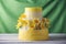 Beautiful home yellow wedding three-tiered cake decorated with red spring flowers. Concept floral trends in desserts