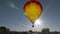 Beautiful Hot Air Balloon Backlit by Morning Sun