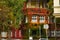 Beautiful house with ivy. Beautiful autumn. Beautiful house. Facade of the house with ivy.Texture. Background.