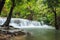 Beautiful Huai Mae Khamin waterfall in the rainy season