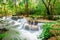 Beautiful Huay Mae Khamin waterfall in tropical rainforest at Sr