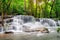 Beautiful Huay Mae Khamin waterfall in tropical rainforest at Sr