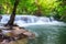 Beautiful Huay Mae Khamin waterfall in tropical rainforest at Sr