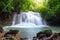 Beautiful Huay Mae Khamin waterfall in tropical rainforest at Sr