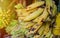 Beautiful hundreds of yellow and ripe bananas in some fruit shop in Asia