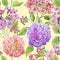 Beautiful hydrangea flowers with green leaves on light yellow background. Seamless floral pattern. Watercolor painting.