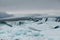 beautiful icebergs, glacier and snow-covered hills