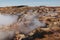 beautiful icelandic landscape with steam from hot springs at sunny day, Gunnuhver Hot Springs,