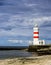 Beautiful Icelandic Lighthouse on the Icelandic coastline Fjords.