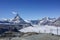 Beautiful iconic mountain Matterhorn with clear blue sky and mist below, Zermatt, Switzerland