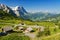 Beautiful idyllic mountains landscape with country house (chalet) in summer