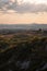 Beautiful idyllic sunny late summer landscape of Toscana with hills, trees, fields and forests. Evening or morning in Italy.