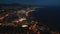 beautiful illuminated night city aerial view on ocean shore, Tenerife, Canary