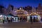 Beautiful illuminated wooden pavilion at traditional Christmas market at Wroclaw. Night time