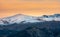 Beautiful image of Sierra Nevada sky stations and snowcapped mountains around during sunset, Granada