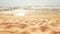 Beautiful image of summer golden sand beach and a calm wave of the surf.