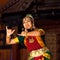 Beautiful Indian girl dancing classical traditional Indian dance