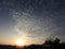 Beautiful Indian Sunrise and sunset near the village with dusk background and Moon visible in the day blue sky