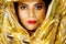 Beautiful Indian woman in golden headgear