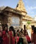 Beautiful Indian women in traditional attire outside the Laxminath Temple in Jaisalmer