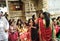 Beautiful Indian women in traditional attire outside the Laxminath Temple in Jaisalmer