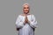 Beautiful Indonesian muslim woman greetings gesture typical of Ramadan and celebrating Eid Al-Fitr