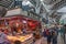 The beautiful indoor market Mercat Central, including a booth with cheeses and hams, Valencia, Spain