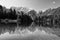 Beautiful Inferiore Fusine lake with Mangart mountain in background, Julian Alps, Italy, Europe.