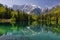 Beautiful Inferiore Fusine lake with Mangart mountain in background, Julian Alps, Italy, Europe.