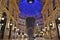 Beautiful inside panoramic view to the Vittorio Emanuele II Gallery with giant blue crest made of Swarovski crystals.