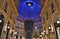 Beautiful inside panoramic view to the Vittorio Emanuele II Gallery with giant blue crest made of Swarovski crystals.