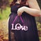 Beautiful instagram of pregnant woman holding quote forest path